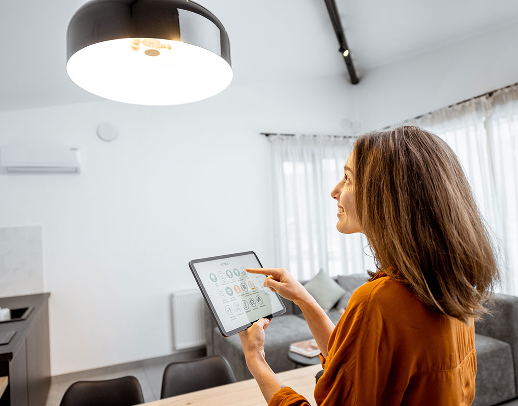 woman using Smart Home controls